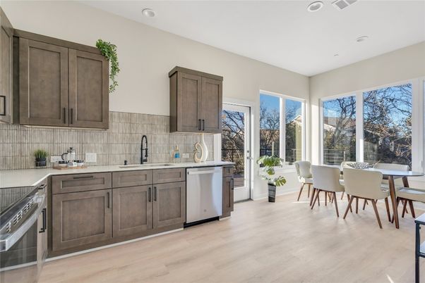 Dining room, Interior, Kitchen, Recessed Lighting, Stainless Steel Appliances, Wood Texture Flooring