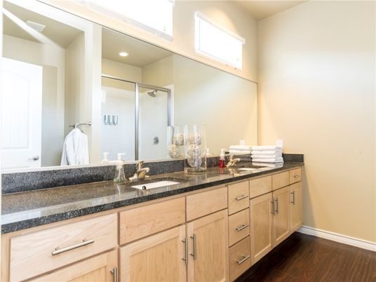 Bathroom, Dual Sink Vanities, Glass Shower, Interior, Recessed Lighting, Wood Texture Flooring