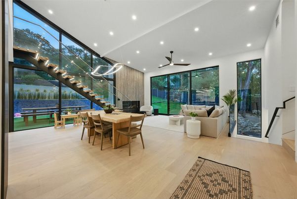 Dining room, Fireplace, Interior, Living room, Recessed Lighting, Wood Texture Flooring