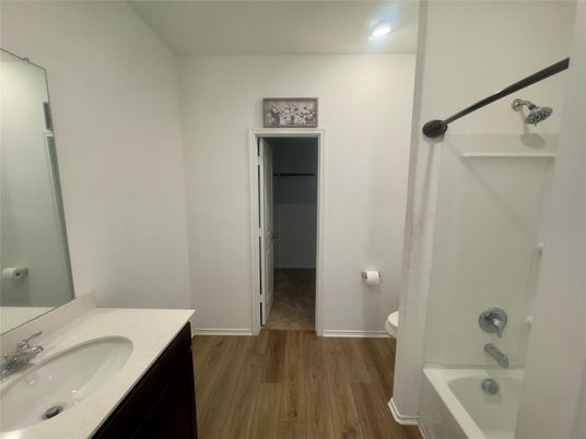 Bathroom, Dual Sink Vanities, Interior, Recessed Lighting, Wood Texture Flooring
