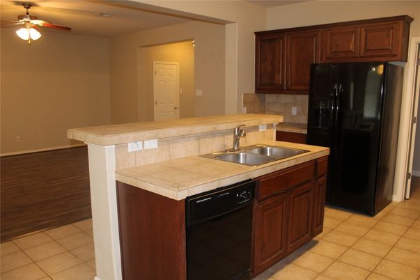 Interior, Kitchen, Tile Countertops, Wood Texture Flooring