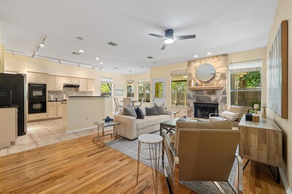Dining room, Fireplace, Interior, Kitchen, Living room, Pendant Lights, Recessed Lighting, Stainless Steel Appliances, Stone Walls, Wood Texture Flooring