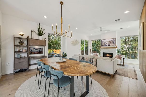 Dining room, Fireplace, Interior, Living room, Pendant Lights, Recessed Lighting, Wood Texture Flooring
