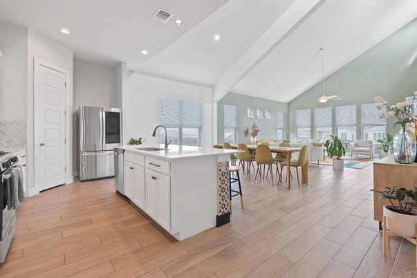 Dining room, Interior, Kitchen, Pendant Lights, Recessed Lighting, Stainless Steel Appliances, Wood Texture Flooring