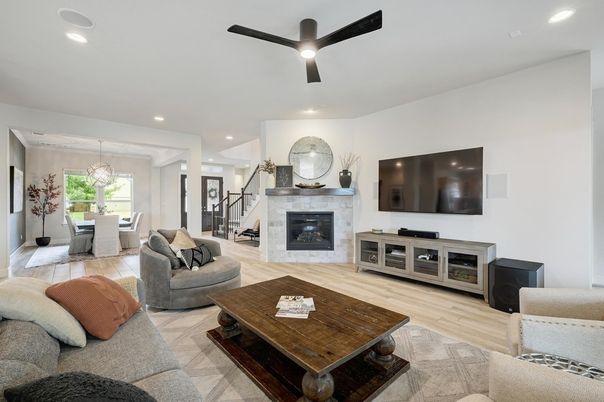 Dining room, Fireplace, Interior, Living room, Pendant Lights, Recessed Lighting, Wood Texture Flooring