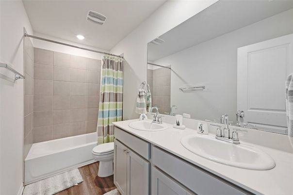 Bathroom, Dual Sink Vanities, Interior, Recessed Lighting, Wood Texture Flooring