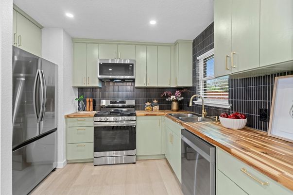 Interior, Kitchen, Recessed Lighting, Stainless Steel Appliances, Wood Texture Flooring