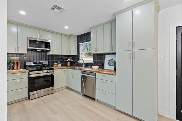 Interior, Kitchen, Recessed Lighting, Stainless Steel Appliances, Wood Texture Flooring