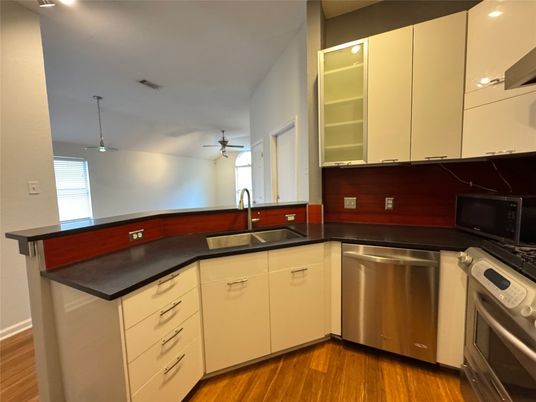 Interior, Kitchen, Recessed Lighting, Stainless Steel Appliances, Wood Texture Flooring