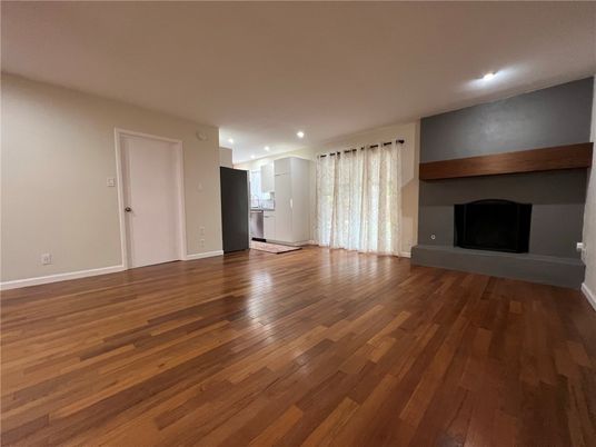 Empty room, Fireplace, Interior, Recessed Lighting, Wood Texture Flooring