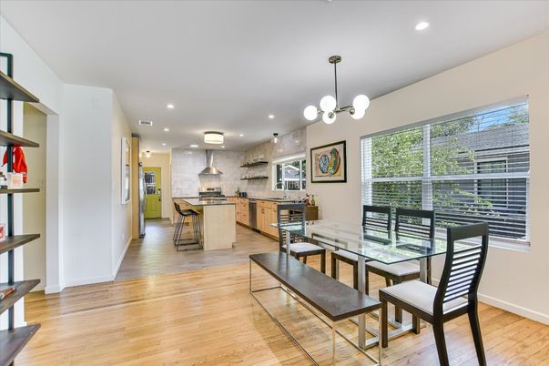 Dining room, Interior, Kitchen, Pendant Lights, Recessed Lighting, Stainless Steel Appliances, Wood Texture Flooring