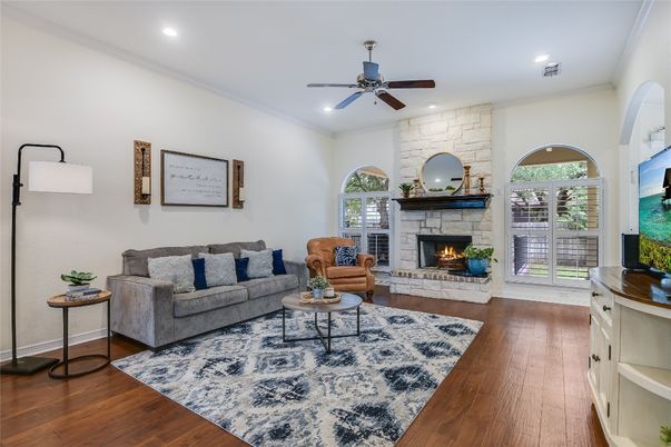 Fireplace, Interior, Living room, Recessed Lighting, Stone Walls, Wood Texture Flooring