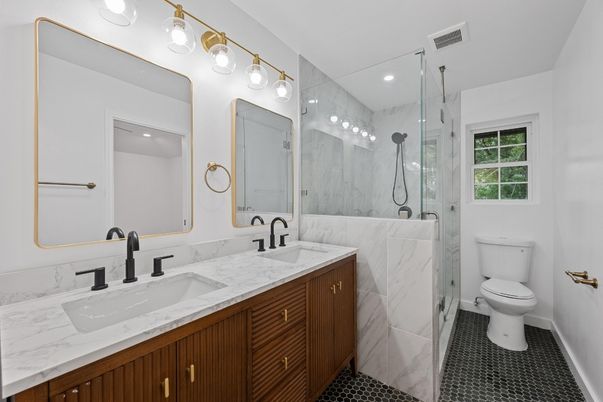 Bathroom, Dual Sink Vanities, Glass Shower, Interior, Marble Walls, Recessed Lighting
