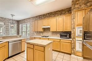 Chandelier, Interior, Kitchen, Pendant Lights, Stainless Steel Appliances, Tile Countertops