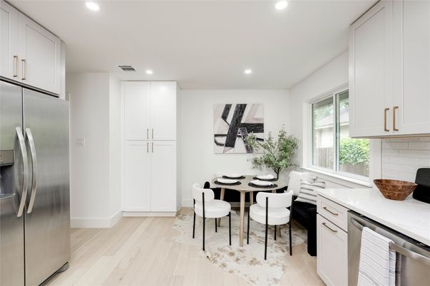 Dining room, Interior, Kitchen, Recessed Lighting, Stainless Steel Appliances, Wood Texture Flooring