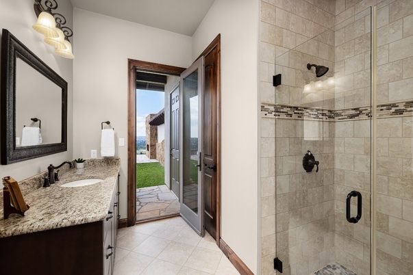 Bathroom, Dual Sink Vanities, Glass Shower, Interior, Stone Walls
