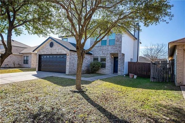 Attached, Backyard, Exterior, Facade, Brick Facade, Split Level