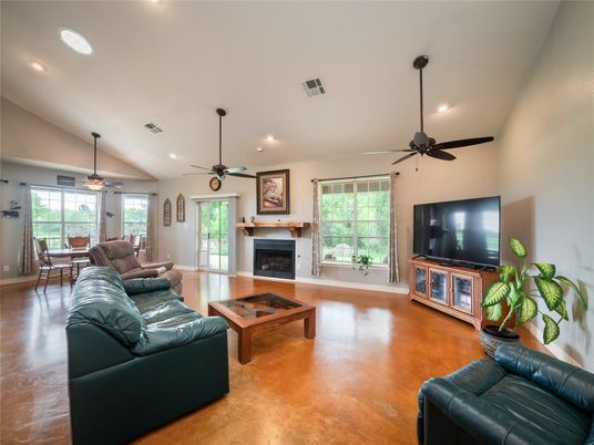 Dining room, Fireplace, Interior, Living room, Recessed Lighting, Wood Texture Flooring
