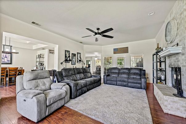 Dining room, Fireplace, Interior, Living room, Pendant Lights, Recessed Lighting, Wood Texture Flooring