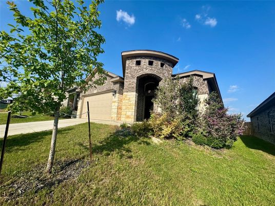 Attached, Backyard, Exterior, Facade, Brick Facade, None