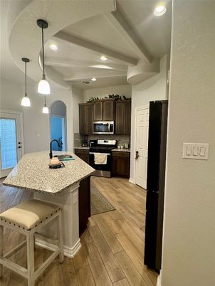 Interior, Kitchen, Pendant Lights, Recessed Lighting, Stainless Steel Appliances, Wood Texture Flooring
