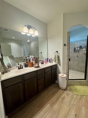 Bathroom, Dual Sink Vanities, Glass Shower, Interior, Wood Texture Flooring