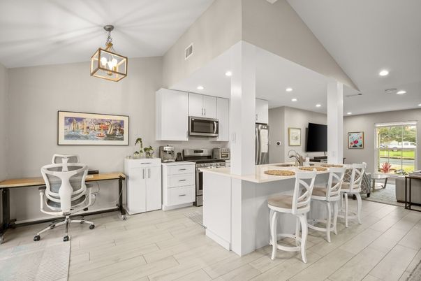 Dining room, Interior, Kitchen, Pendant Lights, Recessed Lighting, Stainless Steel Appliances, Wood Texture Flooring