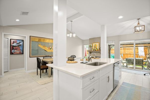 Dining room, Fireplace, Interior, Kitchen, Pendant Lights, Recessed Lighting, Wood Texture Flooring