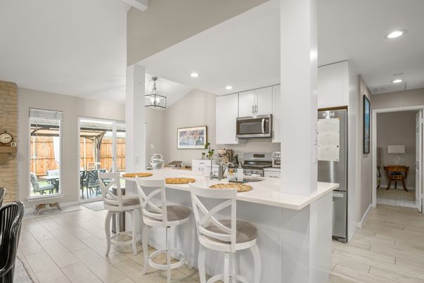 Dining room, Interior, Kitchen, Pendant Lights, Recessed Lighting, Stainless Steel Appliances, Wood Texture Flooring