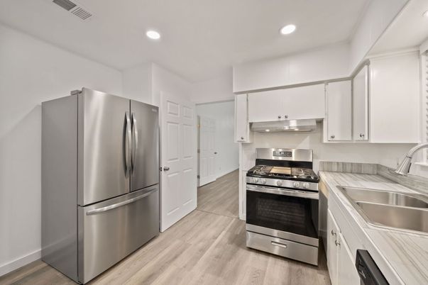 Interior, Kitchen, Recessed Lighting, Stainless Steel Appliances, Wood Texture Flooring