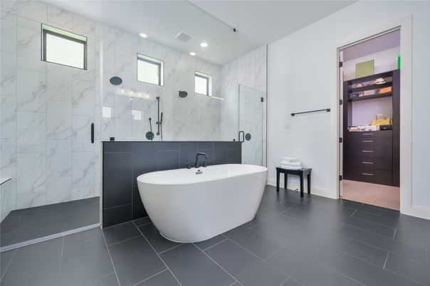 Bathroom, Dual Sink Vanities, Free Standing Baths, Glass Shower, Interior, Marble Walls, Recessed Lighting