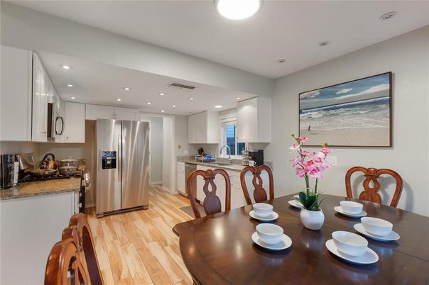 Dining room, Interior, Kitchen, Recessed Lighting, Stainless Steel Appliances, Wood Texture Flooring