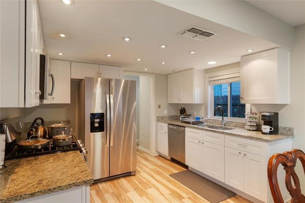 Interior, Kitchen, Recessed Lighting, Stainless Steel Appliances, Wood Texture Flooring