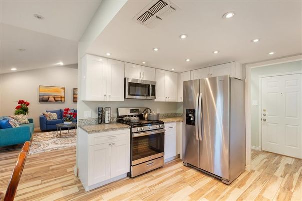 Interior, Kitchen, Living room, Recessed Lighting, Stainless Steel Appliances, Wood Texture Flooring