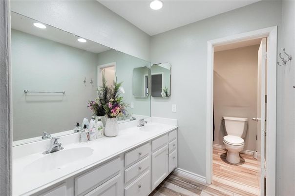 Bathroom, Dual Sink Vanities, Interior, Recessed Lighting, Wood Texture Flooring