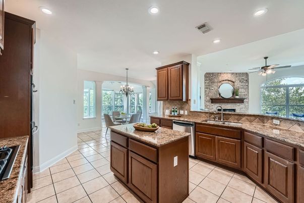 Chandelier, Dining room, Fireplace, Interior, Kitchen, Recessed Lighting, Stone Walls
