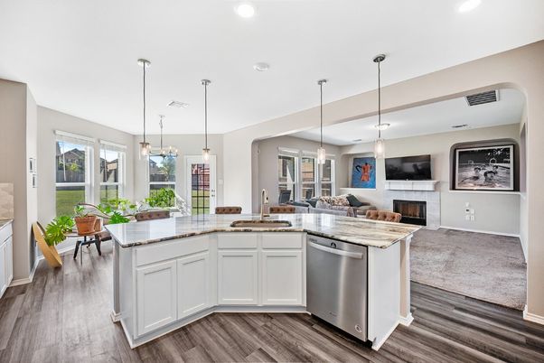 Dining room, Fireplace, Interior, Kitchen, Pendant Lights, Recessed Lighting, Wood Texture Flooring
