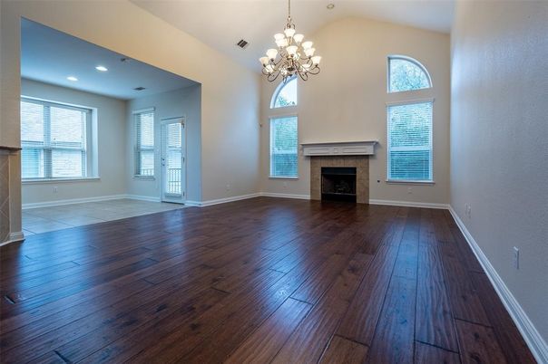Chandelier, Empty room, Fireplace, Interior, Recessed Lighting, Wood Texture Flooring