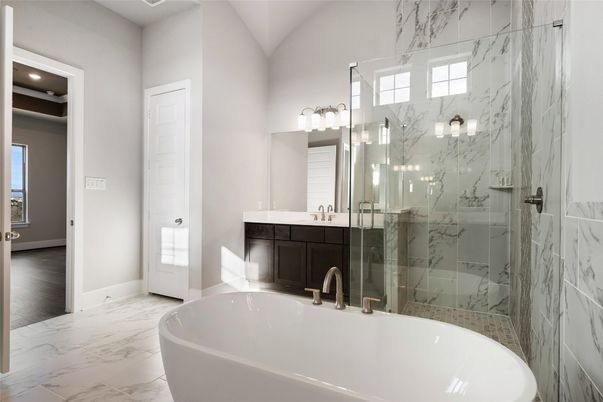 Bathroom, Dual Sink Vanities, Free Standing Baths, Glass Shower, Interior, Marble, Marble Walls, Recessed Lighting