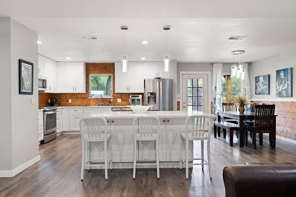 Dining room, Interior, Kitchen, Pendant Lights, Recessed Lighting, Stainless Steel Appliances, Wood Texture Flooring