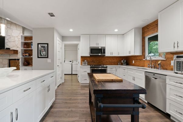 Fireplace, Interior, Kitchen, Recessed Lighting, Stainless Steel Appliances, Stone Walls, Wood Texture Flooring