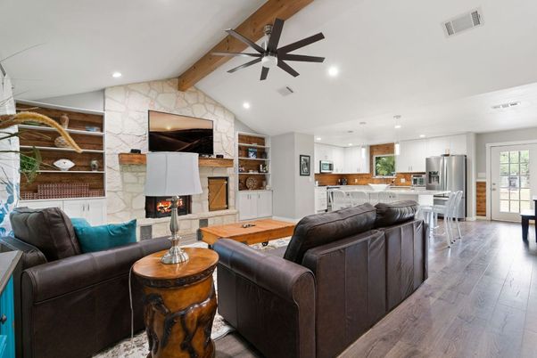 Fireplace, Interior, Kitchen, Living room, Recessed Lighting, Stainless Steel Appliances, Stone Walls, Wooden Beams, Wood Texture Flooring