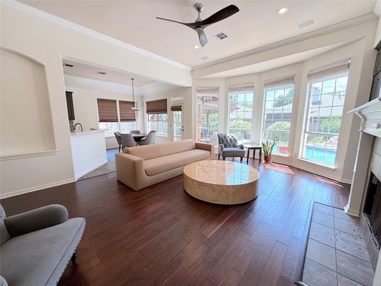 Dining room, Fireplace, Interior, Living room, Pendant Lights, Recessed Lighting, Wood Texture Flooring