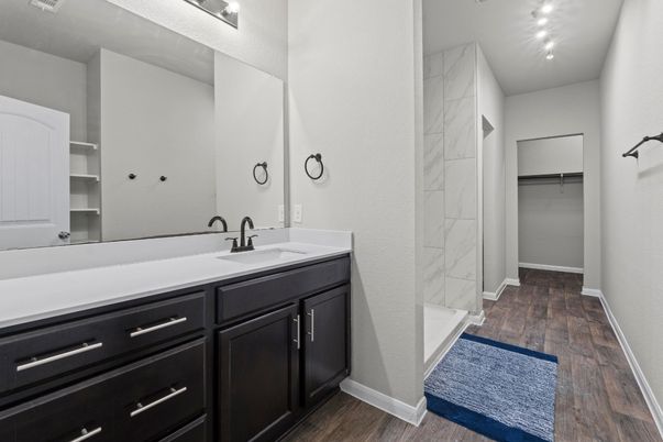 Bathroom, Dual Sink Vanities, Interior, Marble Walls, Wood Texture Flooring