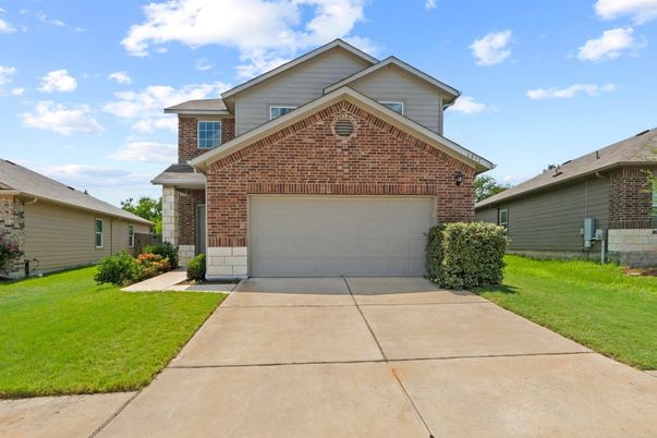 Attached, Exterior, Facade, Brick Facade, Brick Traditional