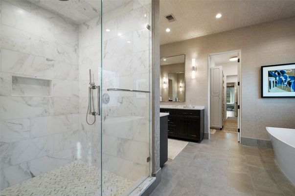 Bathroom, Dual Sink Vanities, Free Standing Baths, Glass Shower, Interior, Marble Walls, Recessed Lighting
