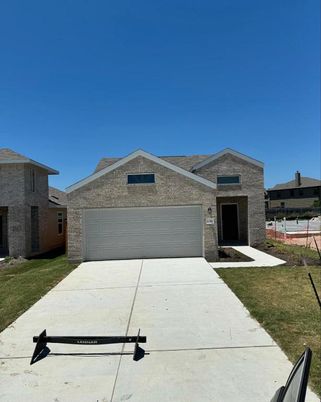 Attached, Exterior, Facade, Brick Facade, American Craftsman