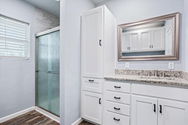 Bathroom, Glass Shower, Interior, Marble Walls, Wood Texture Flooring