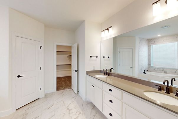 Bathroom, Dual Sink Vanities, Interior, Marble, Marble Walls, Recessed Lighting, Walk-in Closets