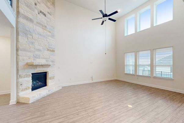Empty room, Fireplace, Interior, Recessed Lighting, Stone Walls, Wood Texture Flooring